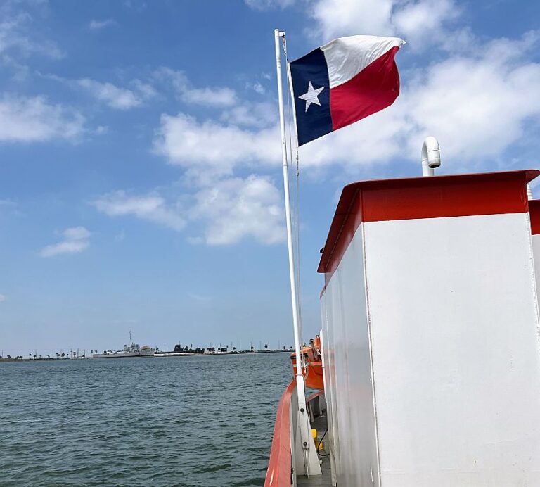 Ferry Crossing showing Texas Flag