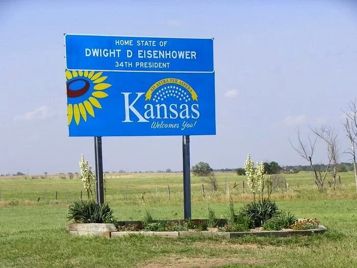 welcome-to-kansas road sign
